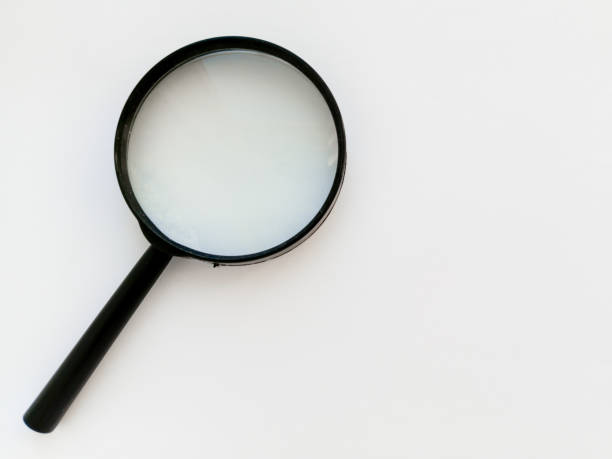 istock A black magnifying glass on a white background. An empty space for the text. Research work. Scientific research. Background. Expertise in court. Medical research. 2189885537