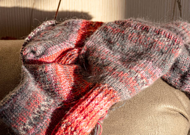 istock colorful knitted work in progress, handicraft concept, knit texture, wool handicrafts, hobby 2189893259