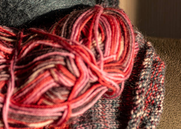 istock colorful knitted work in progress, handicraft concept, knit texture, wool handicrafts, hobby 2189893300