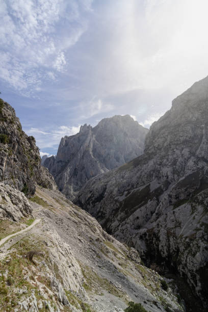 istock The mountain range is covered in snow and the sky is cloudy 2189894134