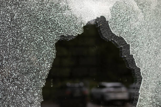 Broken glass. Cracked glass. Spoilt shop window. Lots of shards.