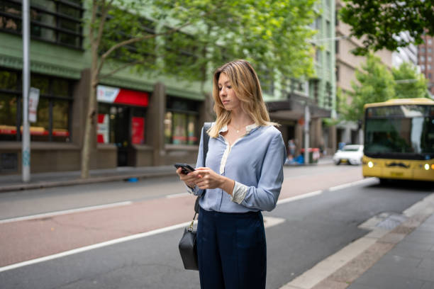 istock Beautiful Woman Waiting for Public Transport 2189897301