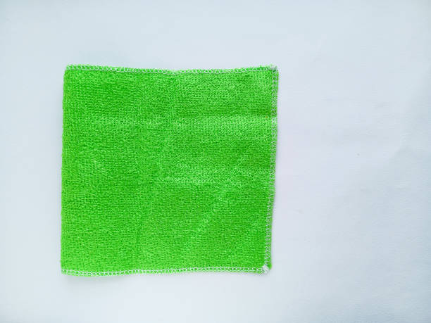 istock A green bamboo cloth on a white background. A rag for washing dishes, dusting.  A duster. 2189897736