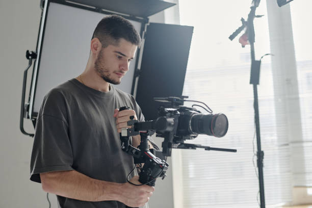 istock Man Enjoying Shooting Film 2189897809