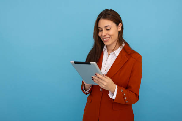 istock Young Latina businesswoman using a tablet 2189899053