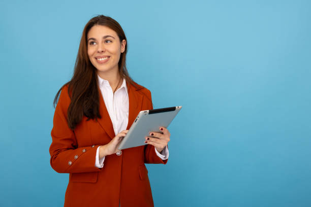istock Confident businesswoman browsing on her tablet 2189899102