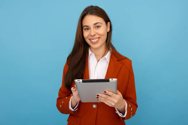 istock Confident businesswoman browsing on her tablet 2189899249