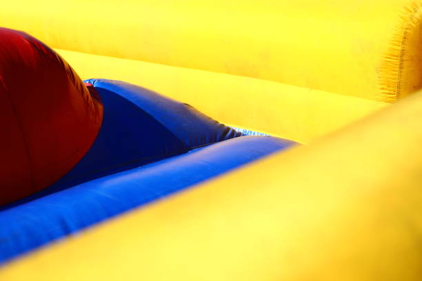 Inflatable obstacle course. Amusement park. An amusement park. Trampoline for playing.
