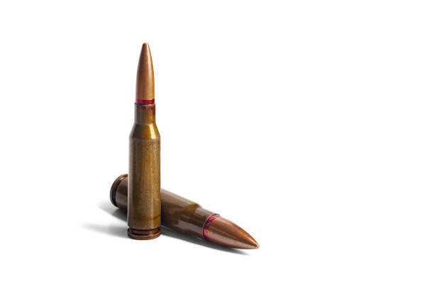 istock Two old bullets for automatic rifles of 5.45 and 7.62 caliber on a white background 2189904032