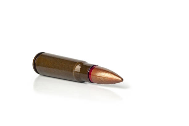 istock Old bullet for an automatic rifle 7.62 on a white. Selective focus. 2189904088
