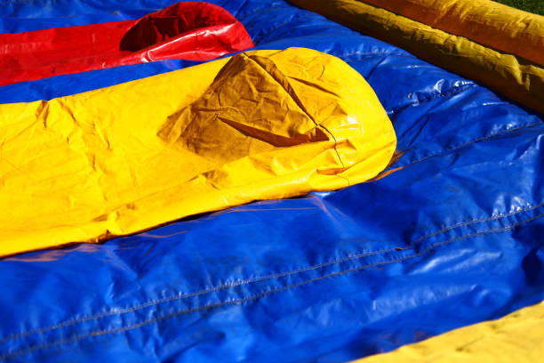 Sports inflatable structure. Amusement park. Trampoline for jumping. An obstacle course for children.