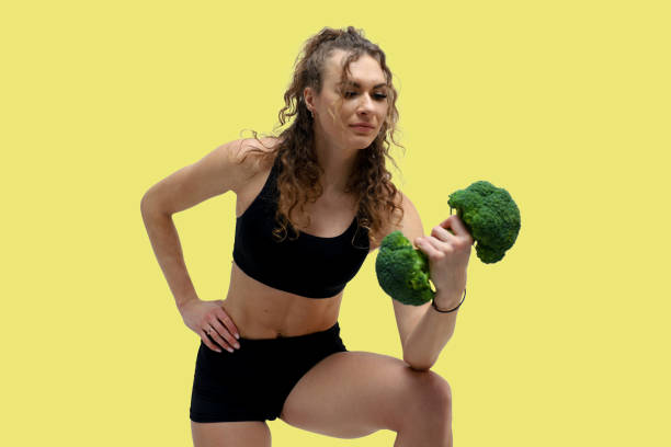 istock Sport girl on color background. 2189906437