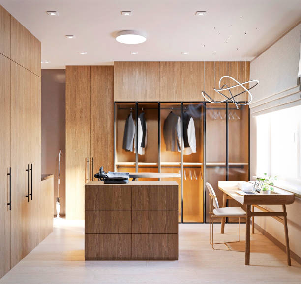 istock 3D render. Interior design of a dressing room with closed cabinets, ironing board, washer and dryer, desk and lamps. 2189912246