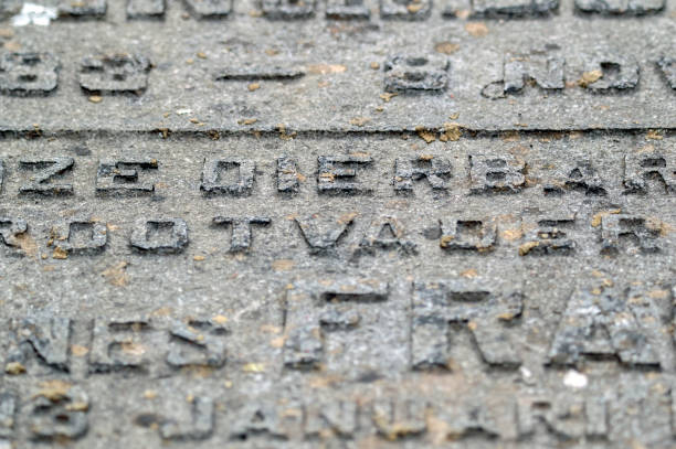 Close-up of the word solidarity carved in stone .