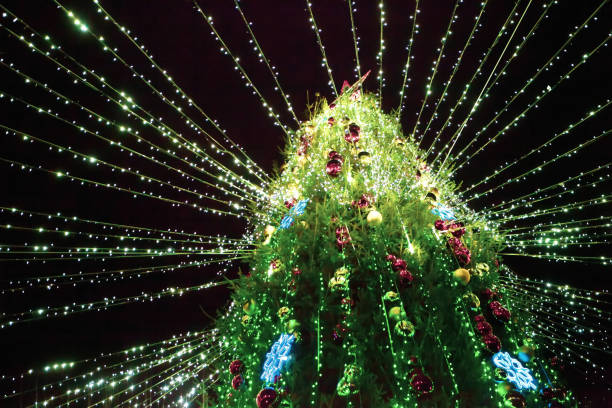 istock Vibrant decorated Christmas tree illuminated with colorful lights in a festive night setting 2189922304