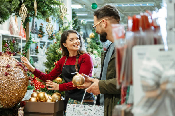 istock Man Shopping with Assistance from Friendly Staff 2189926375
