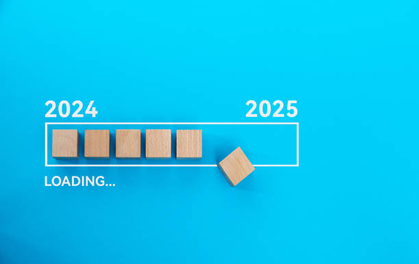 istock Loading bar with wooden blocks 2024 to 2025 on blue background 2189928975