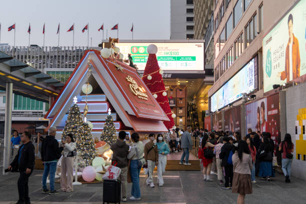 Hong Kong - December 6, 2024 : Christmas decoration are in front of the entrance of Harbour City. Harbour City is the largest shopping mall in Tsim Sha Tsui, Kowloon, Hong Kong.