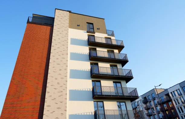 istock Modern facade building on blue sky. Skyscraper facade. Modern High rise residential facade. 2189930974