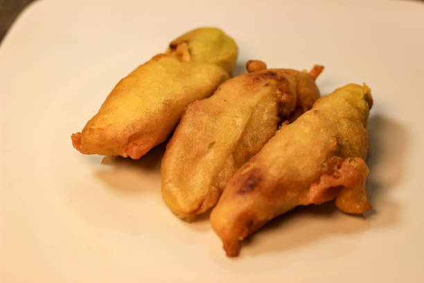 istock Pisang Goreng or Fried banana served on a white plate 2189931216