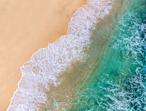 istock Golden sand and turquoise water in a tropical beach 2189932138