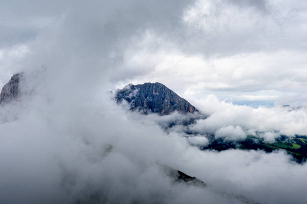 istock mountain landscape in misty and cloudy conditions. 2189932925