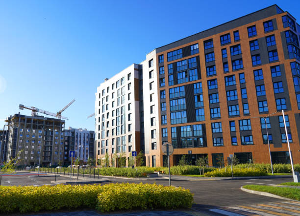 istock Construction of Residential Building. Tower Crane on formworks. 2189935111