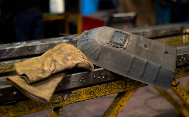 istock gloves and face shield equipment of a welding worker 2189937439