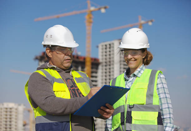 istock The foreman and female civil engineer discussing on the construction plan. 2189944670