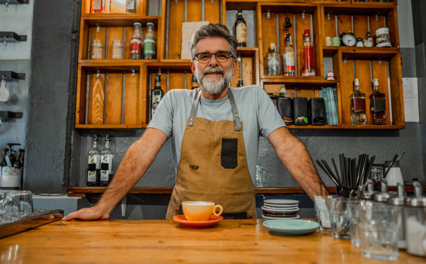 istock Mature male barista at work 2189945547