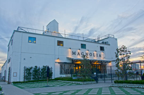 Waco, TX/USA - March 8, 2018: Magnolia Market has revitalized business in downtown Waco, Texas, shown here as the sun sets behind the building.