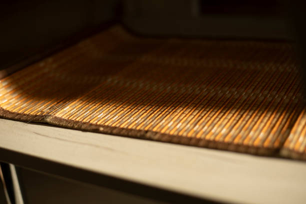 Light on an empty shelf in a room. Daylight in a dark room. Light on a table.