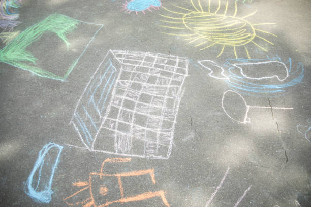 istock Drawing with crayons on the asphalt. Children's creativity. 2189947997