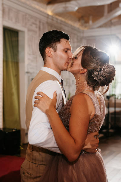istock the first dance of the bride and groom inside a restaurant 2189948119