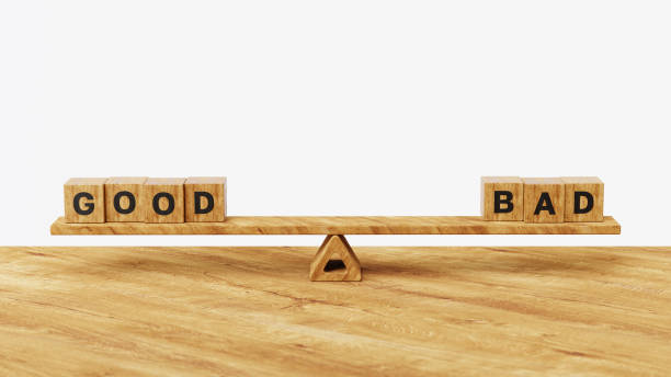 istock 3D good vs bad on balance scales. Different choices, accept or decline, comparison or suggestion concept 2189948248