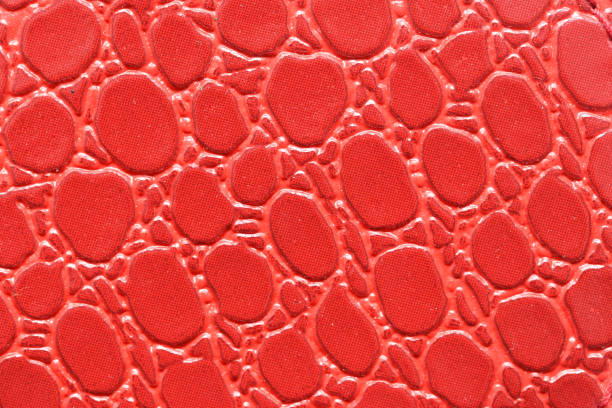 Vibrant background with detailed embossed surface. High-quality synthetic leather backdrop.