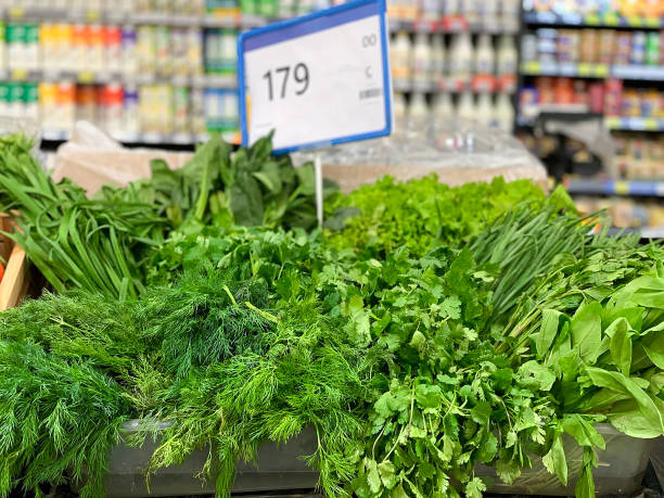 istock a lot of different greens on the counter in a supermarket 2189952257