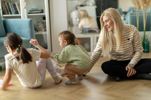 istock Mother playing with her son and daughter 2189955352