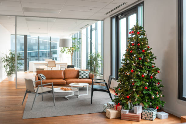 istock Modern Office with Festive Christmas Tree and Gifts 2189962465