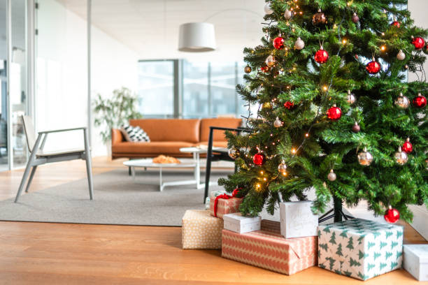 istock Modern Office Christmas Tree with Colorful Presents 2189962497