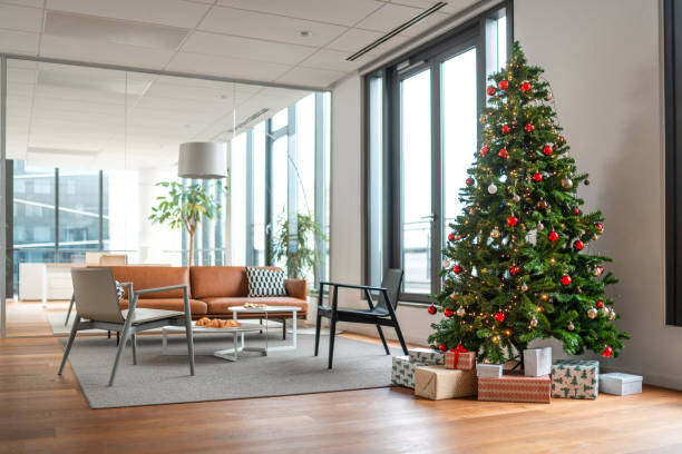 istock Modern Office with Festive Christmas Tree and Gifts 2189962498