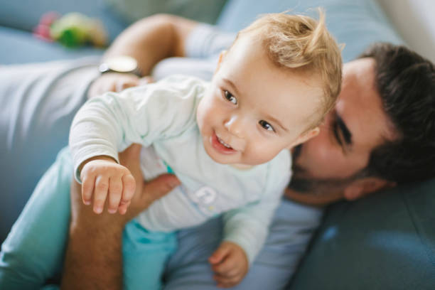 istock Father with his baby boy at home 2189963889