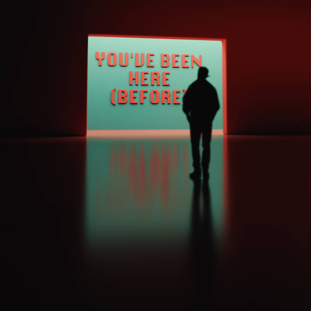 istock Surreal Silhouette in Front of Illuminated Text Wall 2189970377