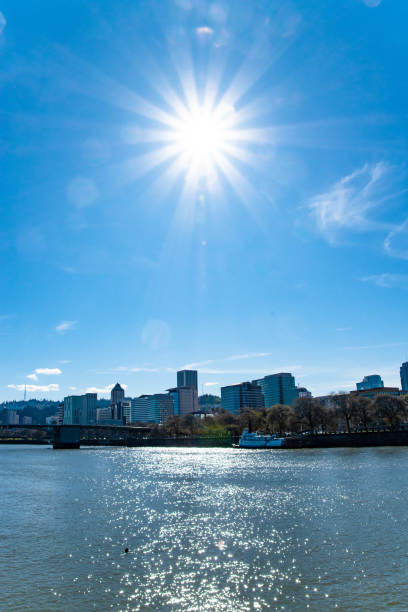 Portland, Oregon City Skyline With Sun Shining on River