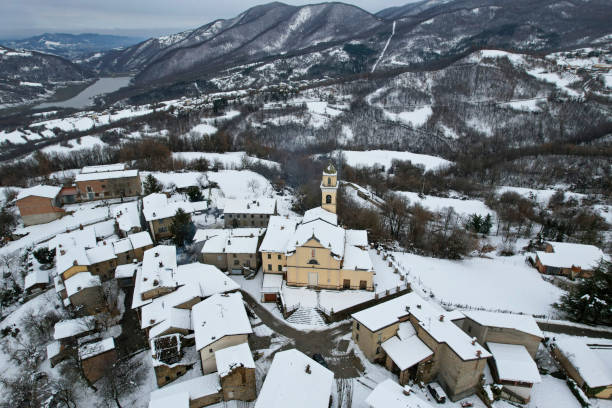 istock Vezzolacca in arda valley covered by snow during winter 2189985199