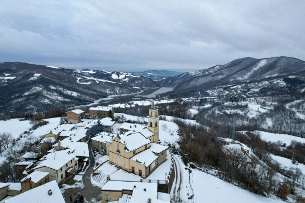 istock Vezzolacca in arda valley covered by snow during winter 2189985205