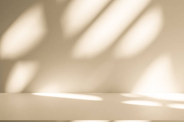 istock Studio style background wall decoration presentation uses white and beige tones. with shadows cast from a nearby window, concept creating a decorative 2189997078