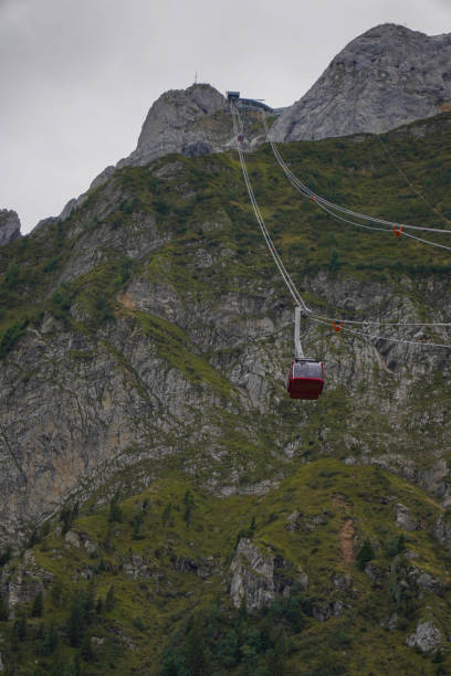 istock Cable Car Ascending Mountain with Rocky Landscape 2189999428