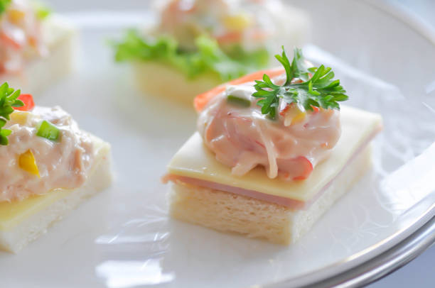 Lettuce sprinkled with mayonnaise.