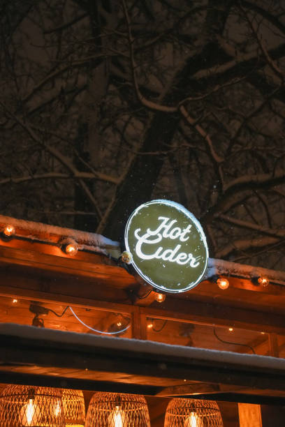 istock Cozy Outdoor Hot Cider Stand at Night 2190002991